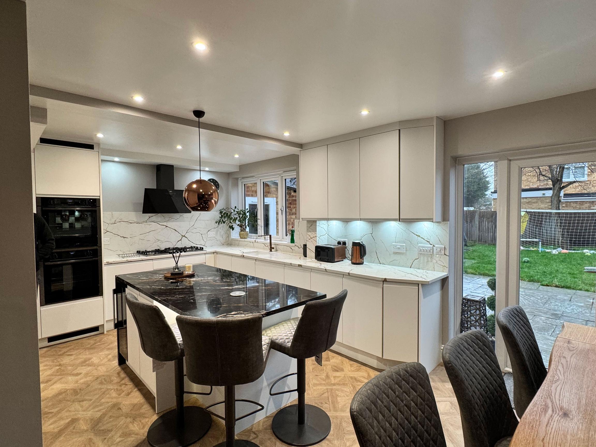 A kitchen design that is unique with a selection of different colours