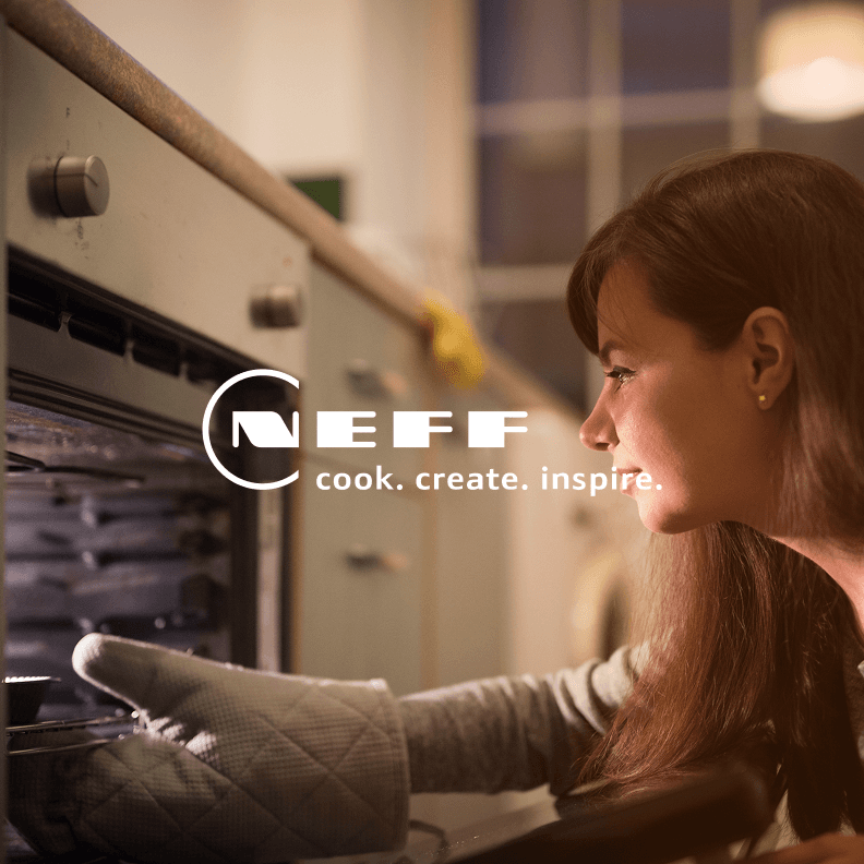 Woman looking into her new Neff oven